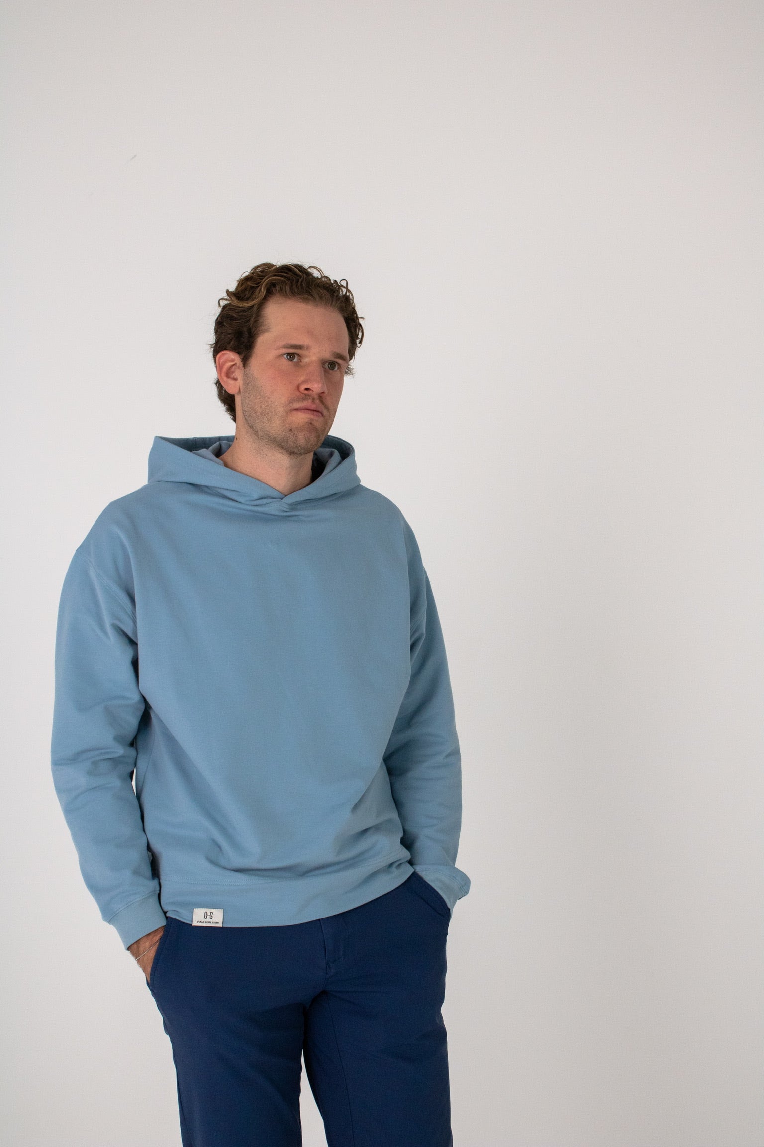 Full body image of Ocean Meets Green men's golf hoodie Wave in ice