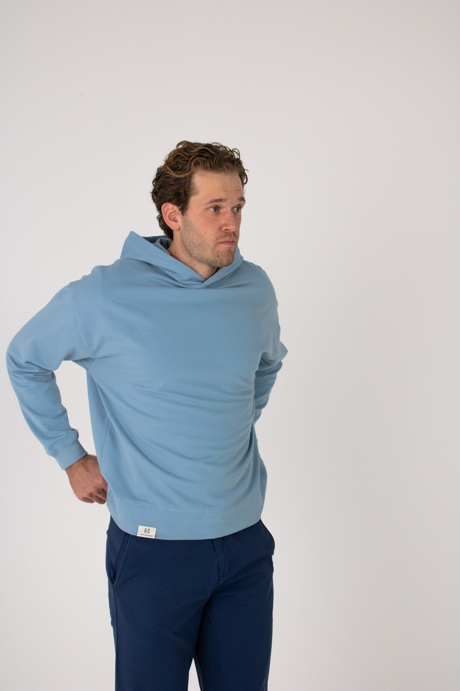 Full body image of Ocean Meets Green men's golf hoodie Wave in ice