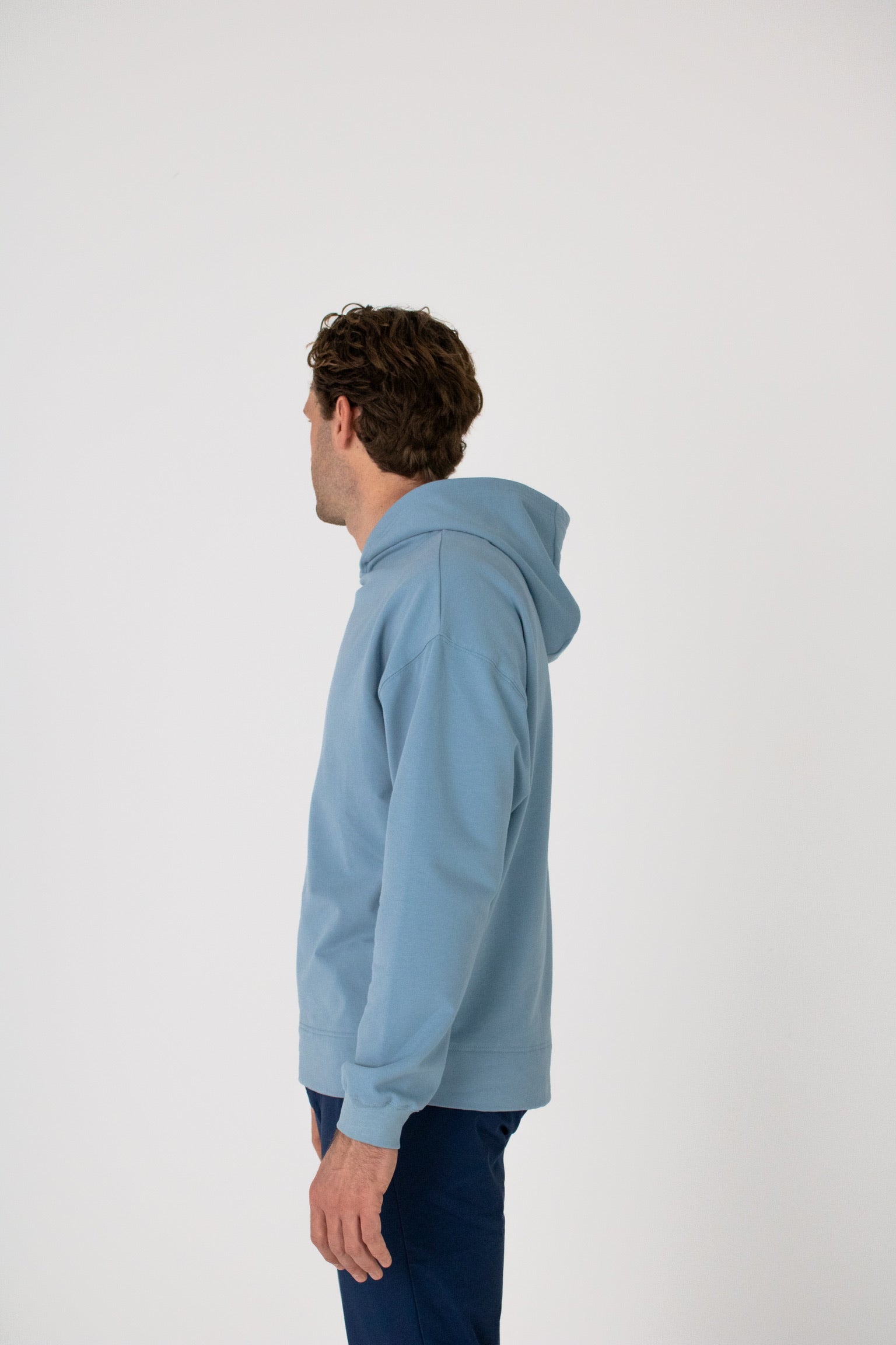Full body image of Ocean Meets Green men's golf hoodie Wave in ice