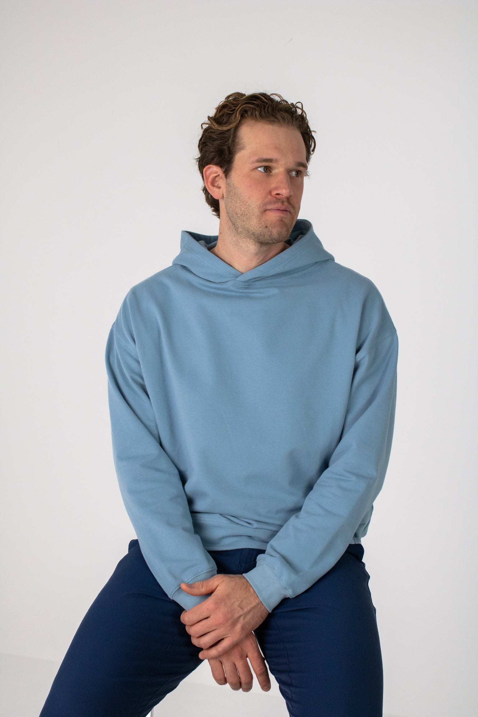 Full body image of Ocean Meets Green men's golf hoodie Wave in ice