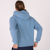 Fullbody image of Ocean Meets Green women's golf hoodie Flow in ice, showing the back