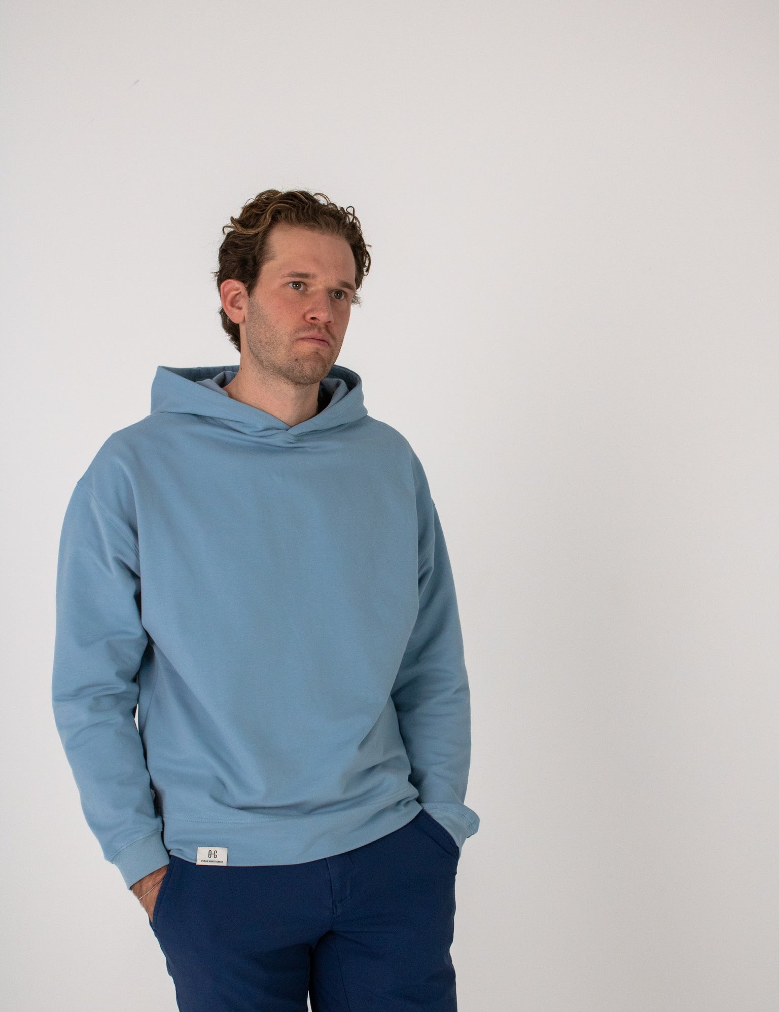 Full body image of Ocean Meets Green men's golf hoodie Wave in ice