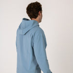 Full body image of Ocean Meets Green men's golf hoodie Wave in ice, showing the logo