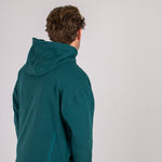 Full body image of Ocean Meets Green men's golf hoodie Wave in pine, showing the back