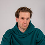 Full body image of Ocean Meets Green men's golf hoodie Wave in pine