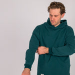 Full body image of Ocean Meets Green men's golf hoodie Wave in pine