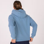 Fullbody image of Ocean Meets Green women's golf hoodie Flow in ice, showing the back