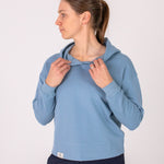 Fullbody image of Ocean Meets Green women's golf hoodie Flow in ice, showing the front opening