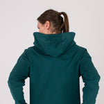 Fullbody image of Ocean Meets Green women's golf hoodie Flow in pine, showing the back