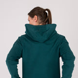 Fullbody image of Ocean Meets Green women's golf hoodie Flow in pine, showing the back