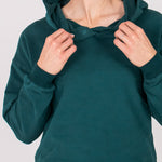 Fullbody image of Ocean Meets Green women's golf hoodie Flow in pine