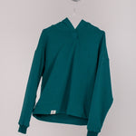 Image of Ocean Meets Green women's golf hoodie Flow in pine on a hanger